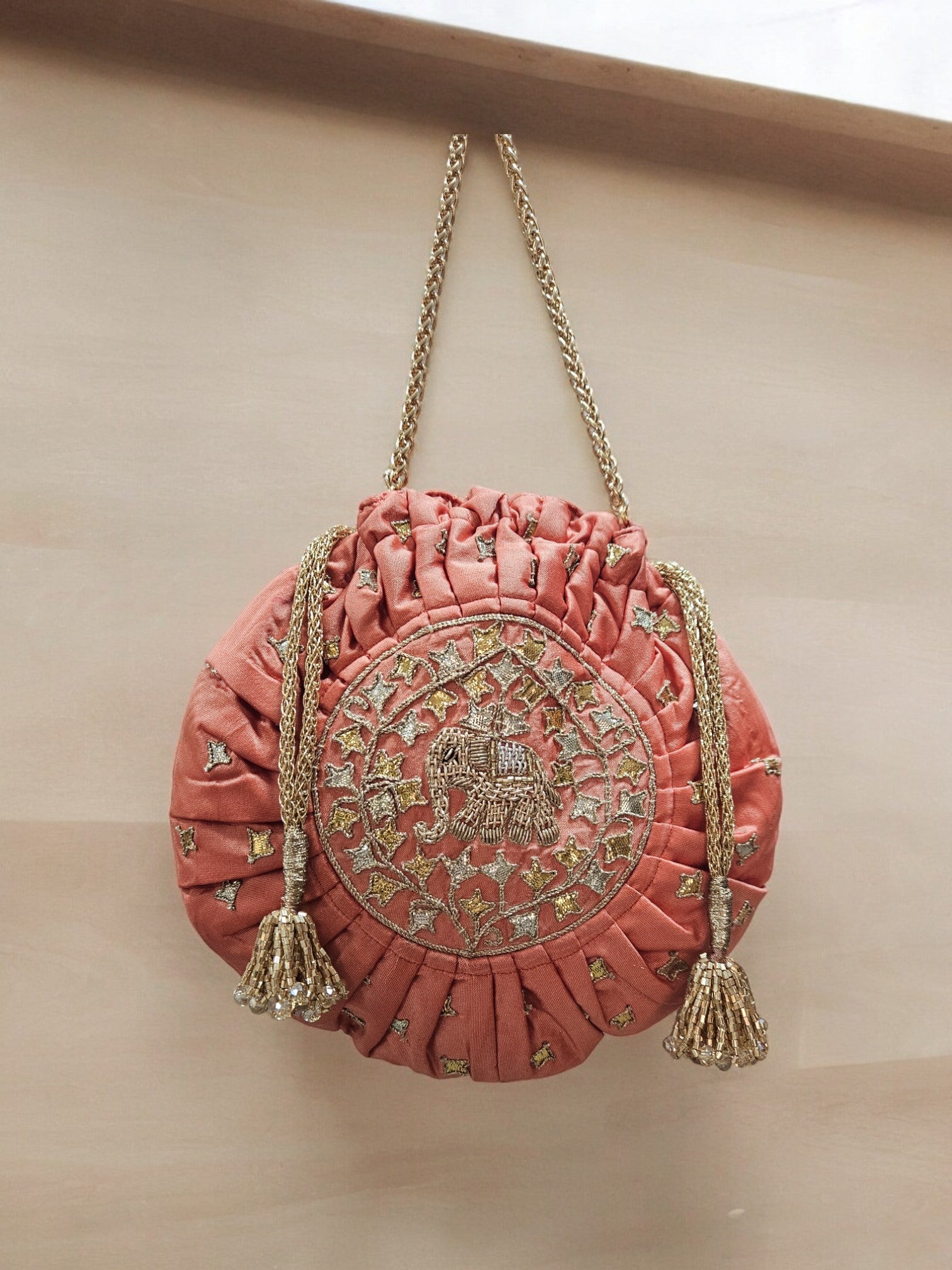 Gold Elephant Motif Potli
