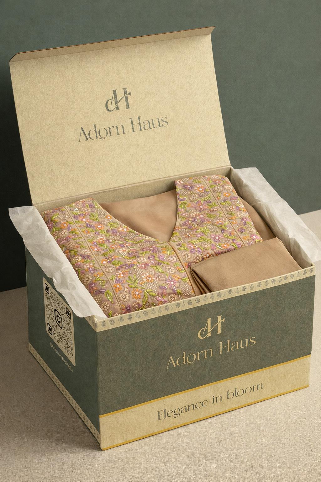 Box of Adorn Haus products with floral and solid designs on a neutral background