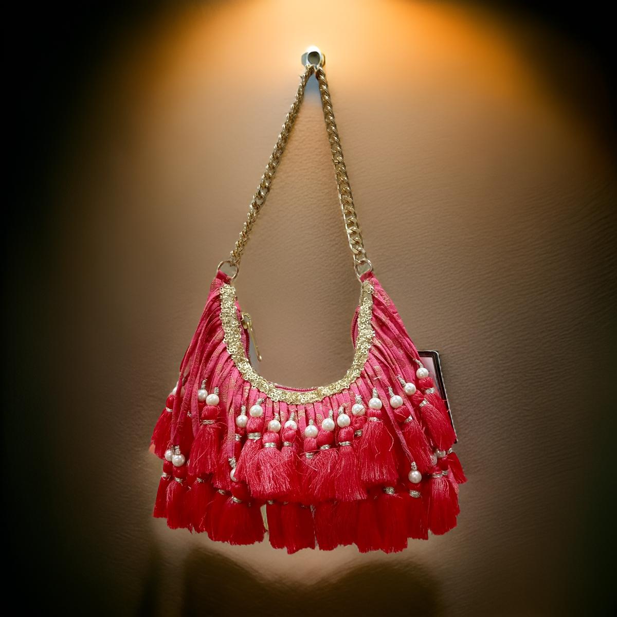 Richly embellished statement Potli with a handcrafted-inspired aesthetic
