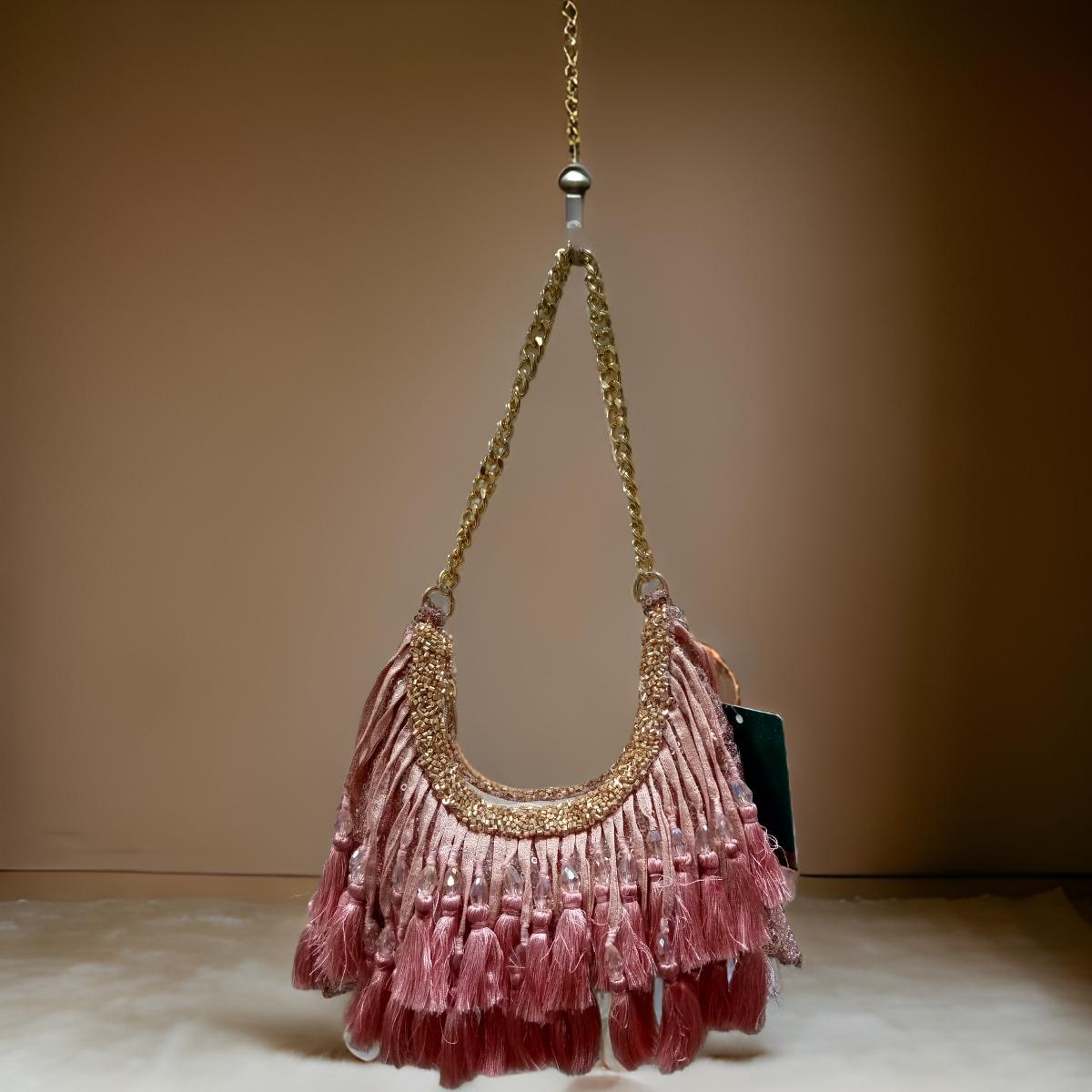 Richly embellished statement Potli with a handcrafted-inspired aesthetic