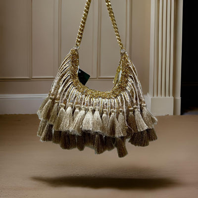 Richly embellished statement Potli with a handcrafted-inspired aesthetic