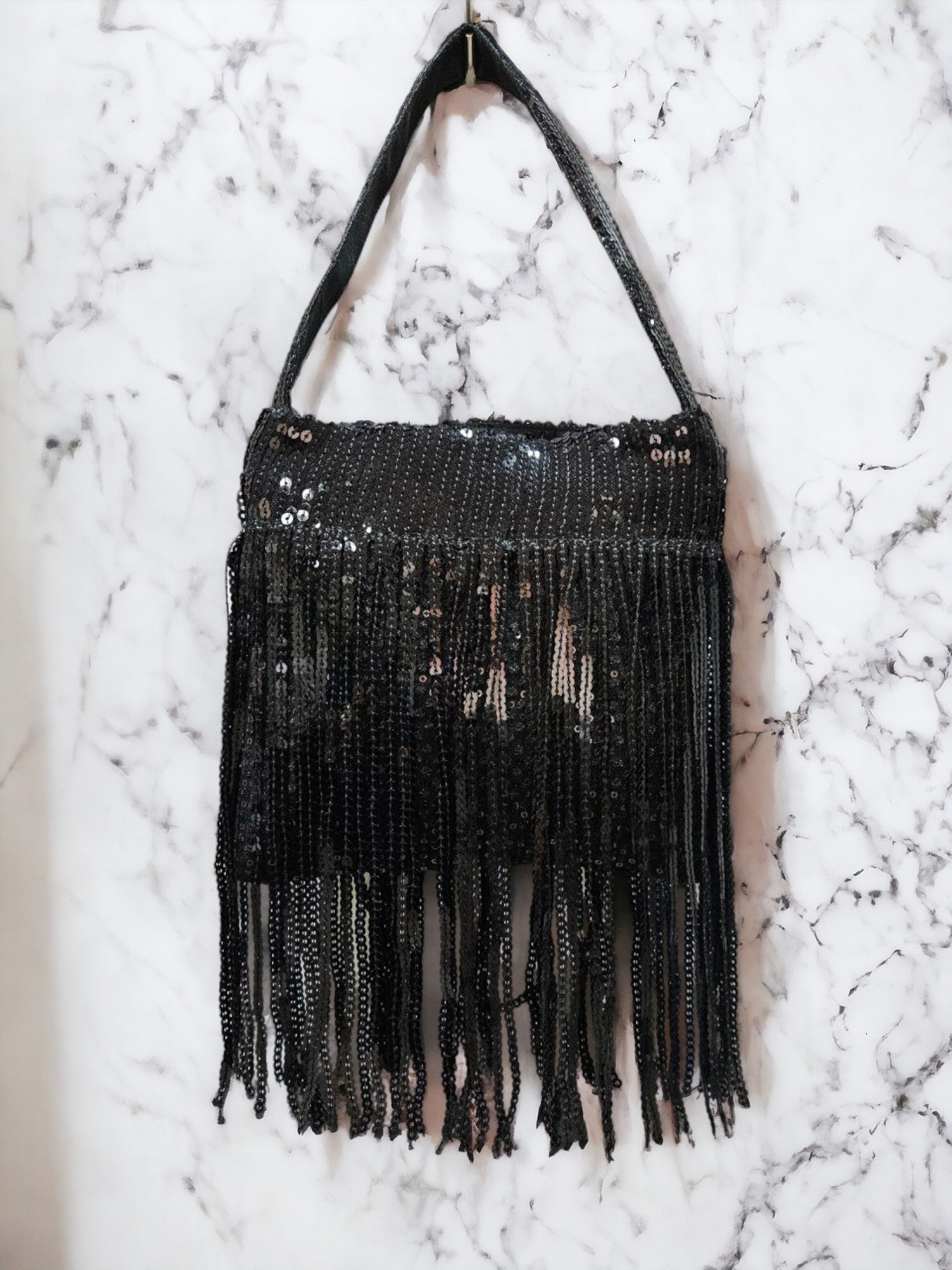 Midnight Tassel Sequin Potli