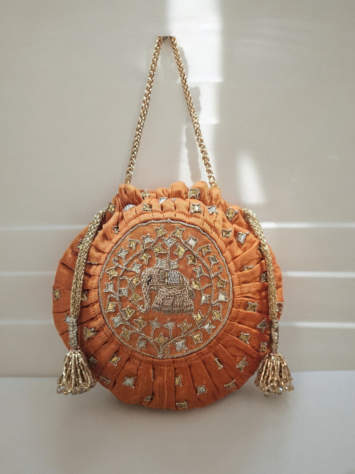 Gold Elephant Motif Potli
