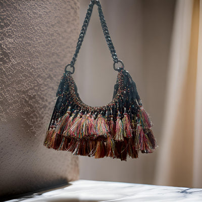 Richly embellished statement Potli with a handcrafted-inspired aesthetic