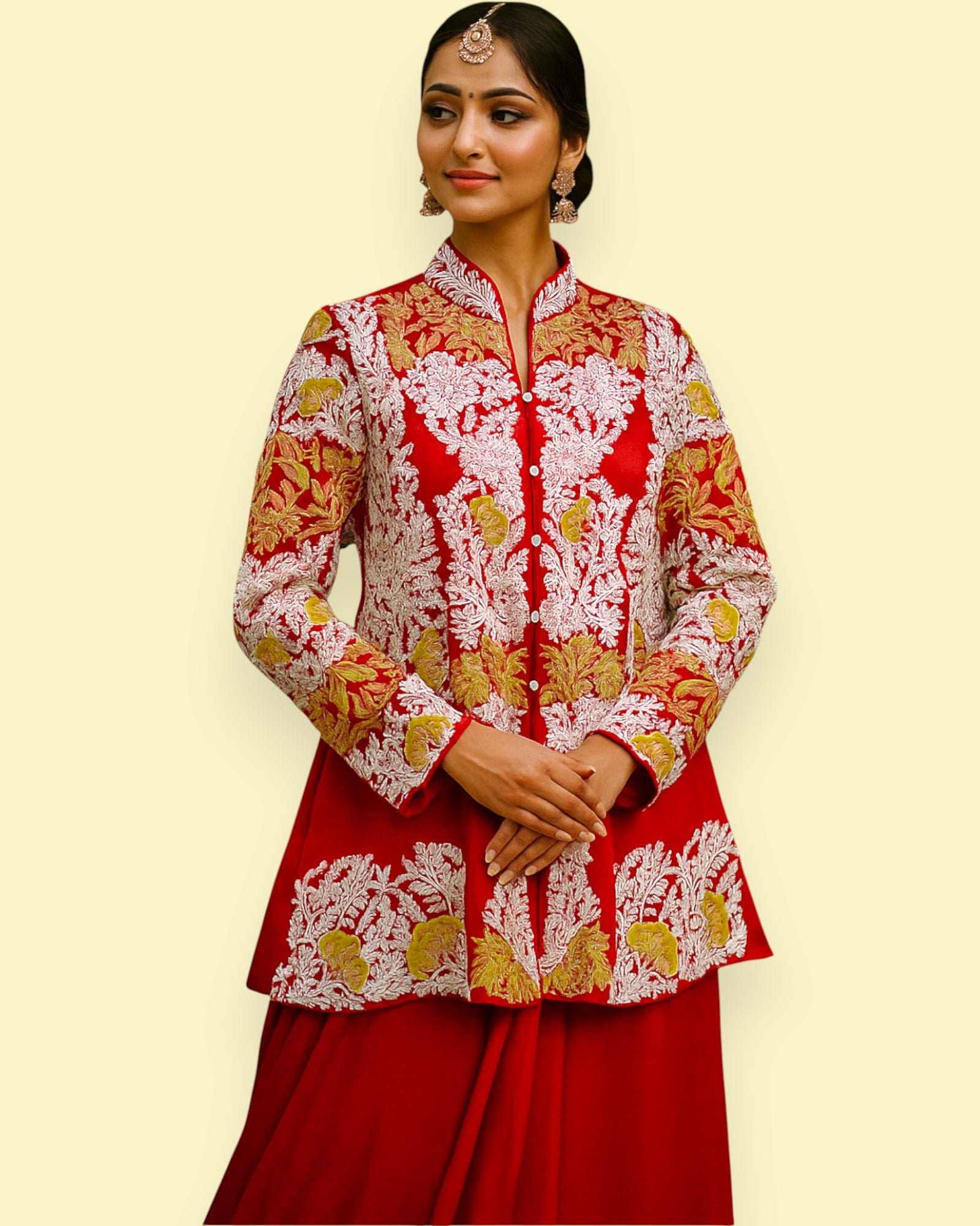 Woman wearing a red and gold embroidered traditional outfit on a beige background