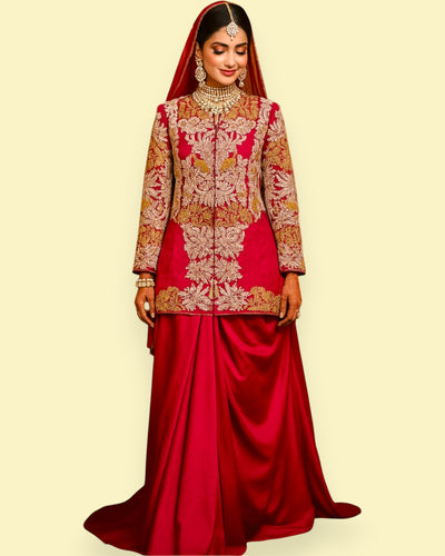 Traditional red and gold embroidered outfit on a plain background