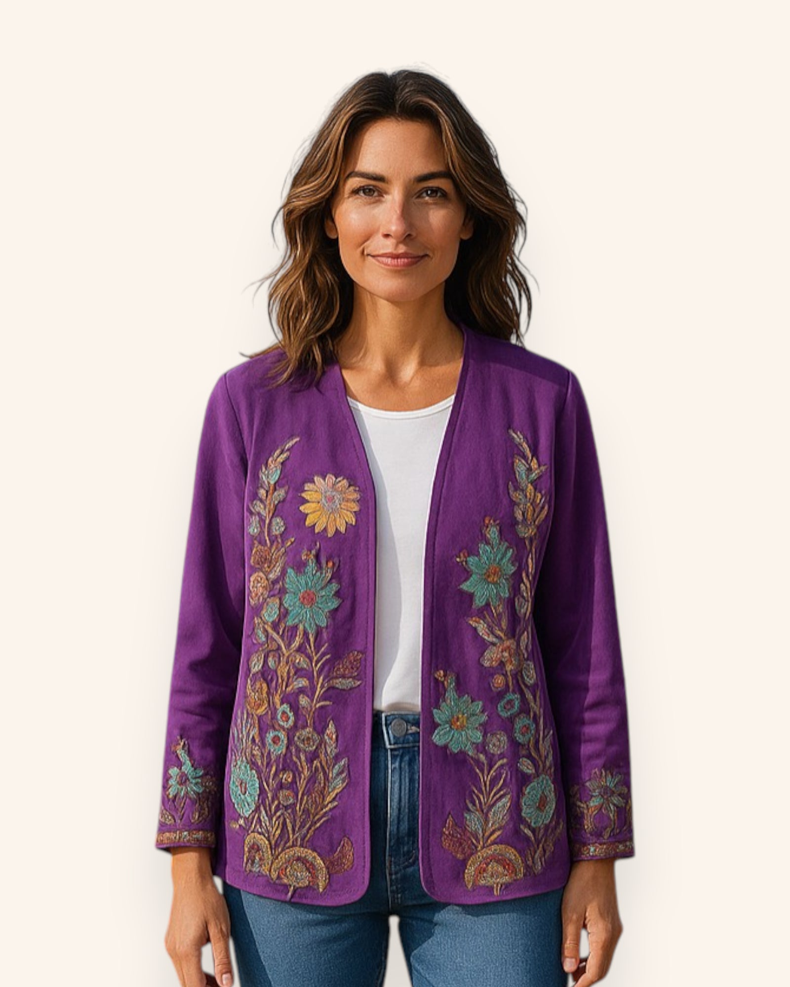 Woman wearing a purple embroidered jacket on a white background