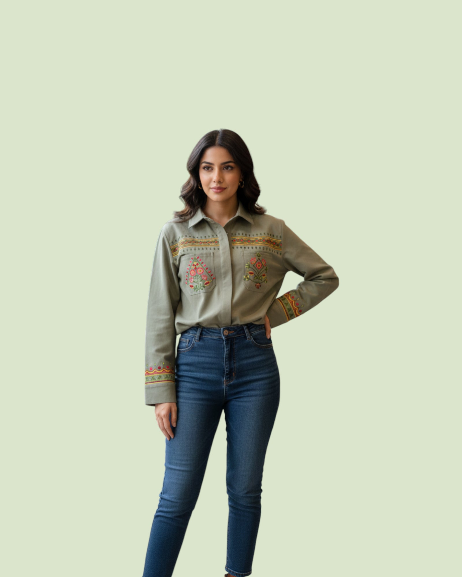 Woman wearing a Embroidery shirt on a light green background