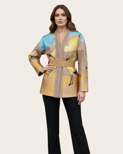 Woman wearing a Embroidery Jacket  on a beige background