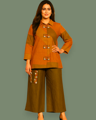 Woman wearing a brown and orange outfit with a matching background